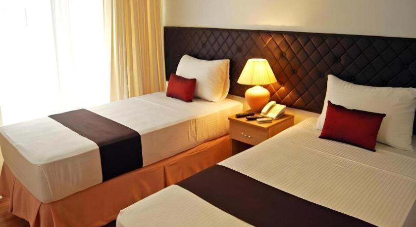 Capitol Central Hotel And Suites Cebu Bagian luar foto