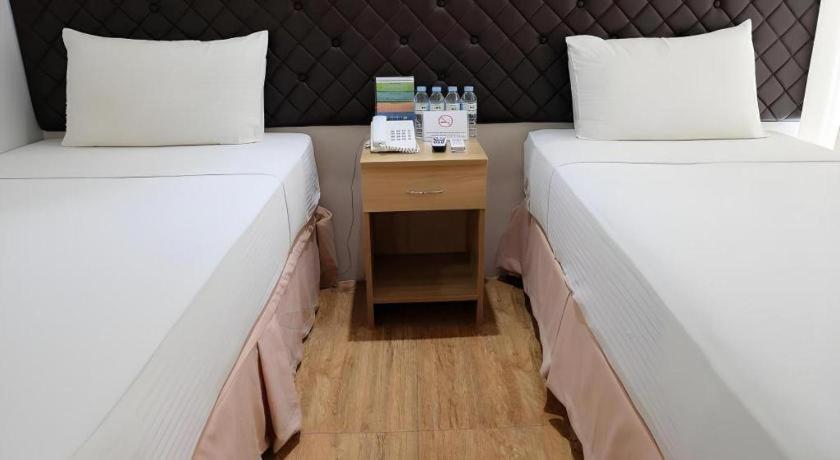 Capitol Central Hotel And Suites Cebu Bagian luar foto